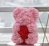 thin pink bear with red heart with box