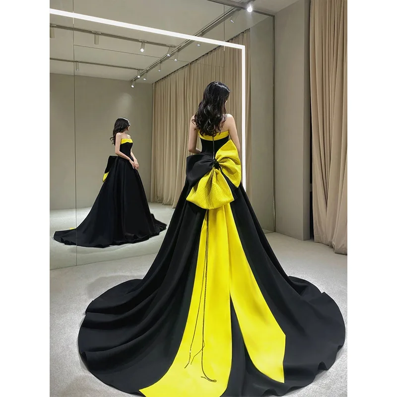 black and gold traditional dresses Black and Gold George Bridal Outfit: Traditional African Wedding Dress