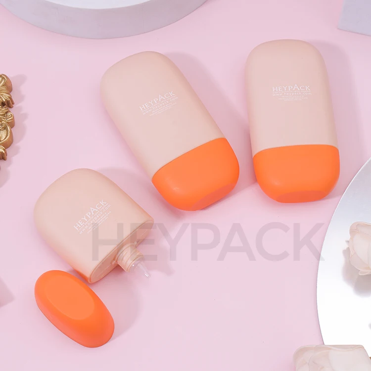 Flat Oval Shape 40ml HDPE Nozzle Applicator Sunscreen Lotion Bottle