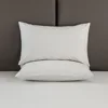 Small white checkered patterns
