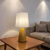 Orange conical-beige straight pleated shade table lamp
