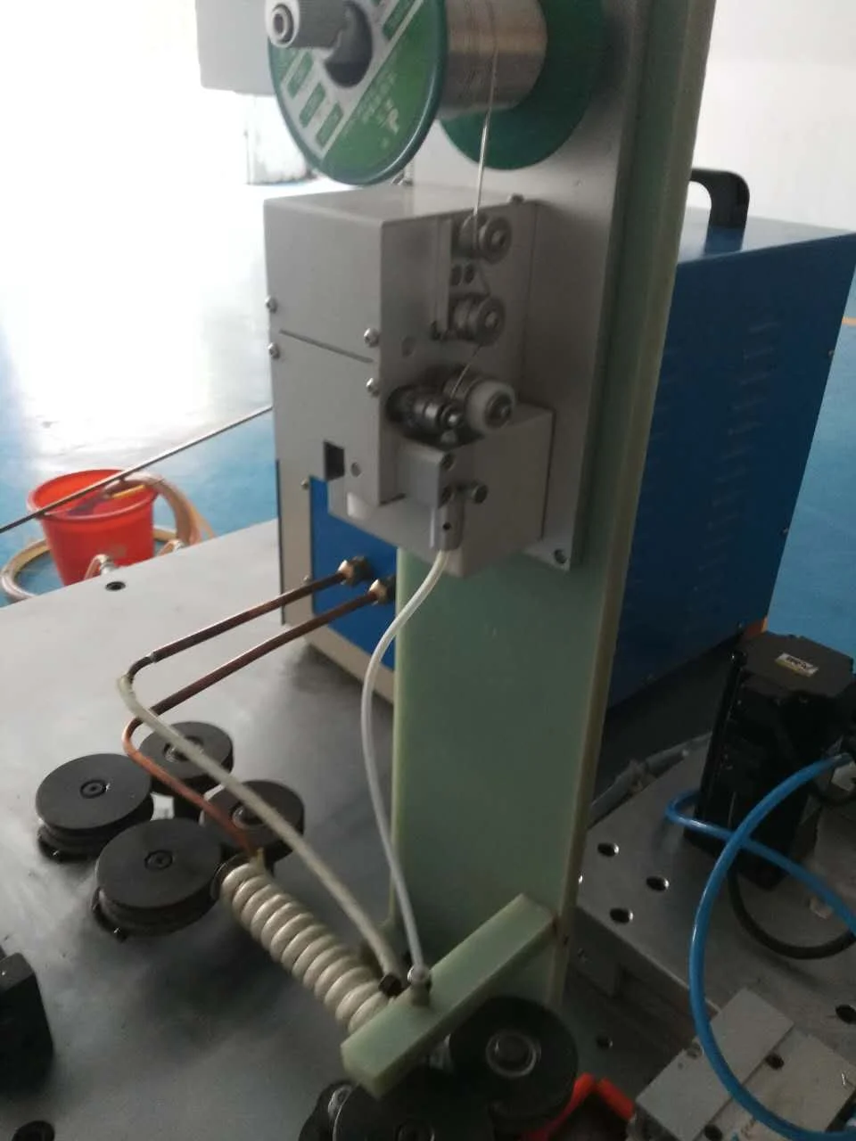 BOBO Machine high frequency connecting capillary tube to copper tube shown in a detail photo for this news article