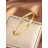 Large gold nail with diamonds