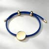 Cordoncino blu+ciondolo dorato