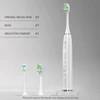 Corps blanc + deux têtes de brosse + chargeur sans fil
