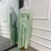 Light green cardigan + inside + hijab