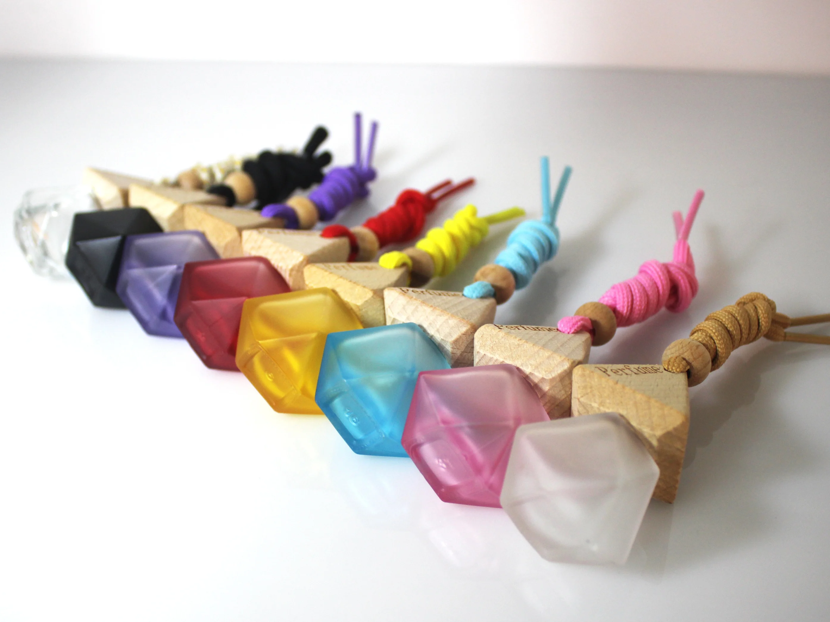 Wholesale 8ML Multi-Color Matte Car Aroma Bottle With Wooden Cover and Lanyard Wonderful Pyramid Shape Car Perfume Diffuser