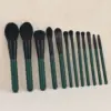 12 green grapes bare brush