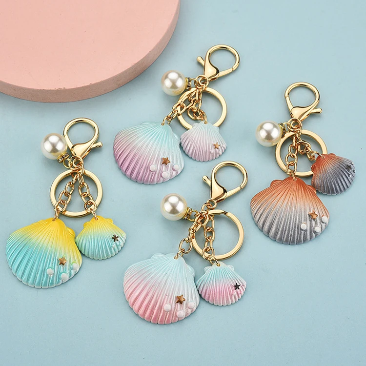 Wholesale 2021 new purse charms accessory resin acrylic cartoon cute  colorful animal marine beach pearl sea shell keychain for kids women From  m.