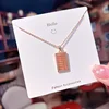 Abaco in oro rosa tempestato di diamanti