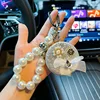 Bow tie style white + beads