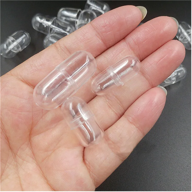 透明カプセルシェルプラスチックピルコンテナ薬ピルケースボトル