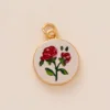 ciondolo fiore rosso in oro 9