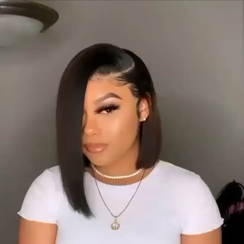 Image of Short blunt cut bob with deep side part quick weave