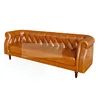Brown three-seat sofa