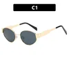 Gold frame, gray lenses