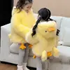 Maglioncino giallo a forma di paperella.