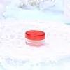 clear jar with red cap