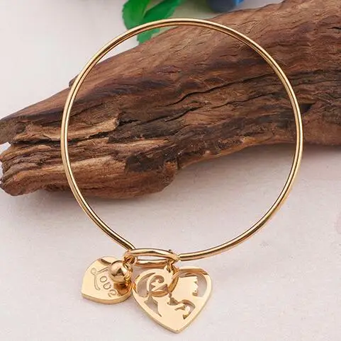 Crazy-M Bracciale da donna a forma di cuore, con ciondolo a forma di cuore, in titanio, argento e oro rosa, ideale come regalo per coppia, mamma, figlia, Taglia unica, Acciaio inossidabile