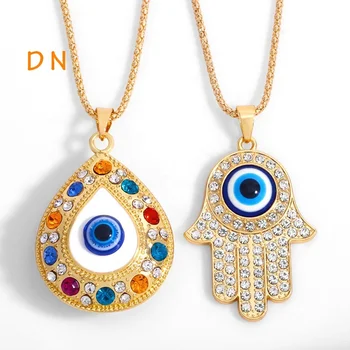 Dina Wholesale European Alloy Fatima Hamsa Hand Charm Necklace Turkey Blue Evil Eyes Diamond Jewelry Sweater Necklace Jewelry