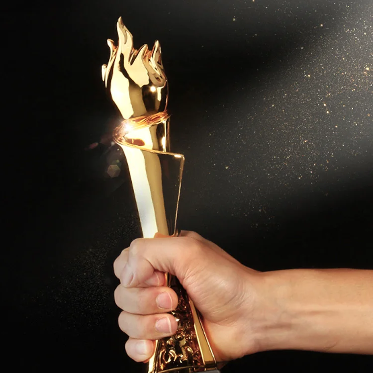 OEM / ODM Sport Crystal Trophy Cheap Creative Flame Shape Luxury Custom Lettering Metal Trophy With Black Base
