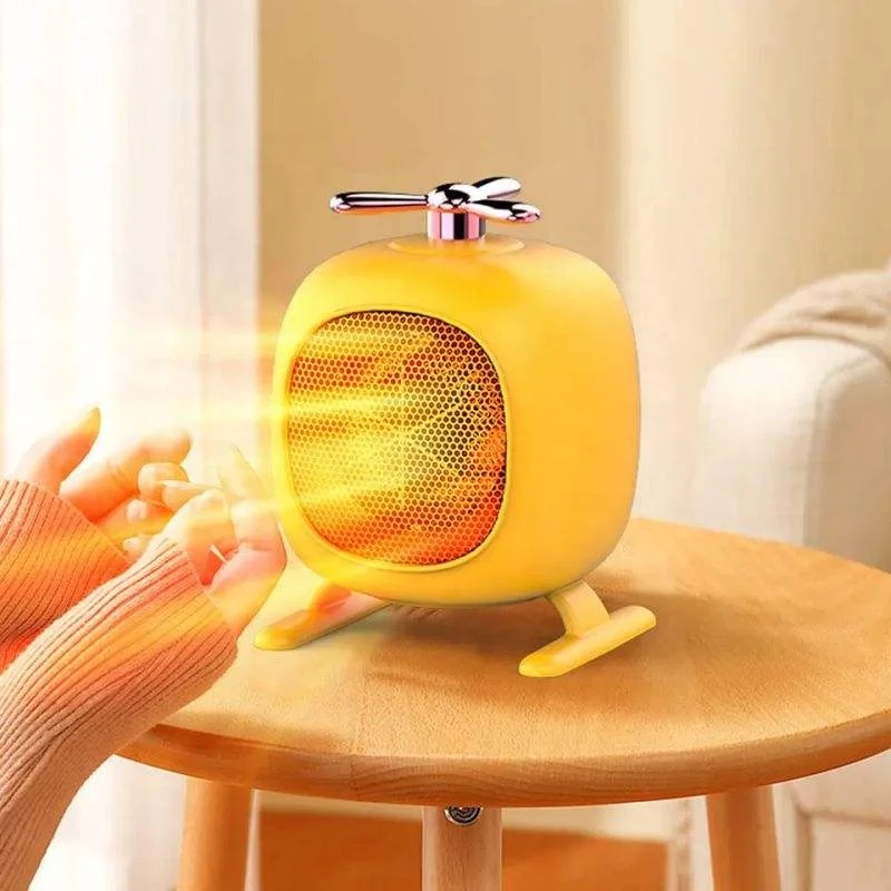 New Mini Home Heater Small Electric Heater Fast Warming Hot air Blower Household Power Saving Desktop Heater 2
