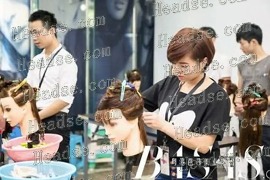Hairdressing salon practice cutting mannequin heads