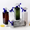 Green bottle with blue white sprayer