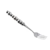 Tenedor de mesa de plata