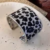 26187c-stampa leopardata nera e grigia