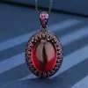 Black Gold red corundum pendant with box chain