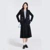 ชุดสูทสีน้ำเงินเข้ม กระโปรงพลีท เสื้อเชิ้ตสีน้ำเงิน