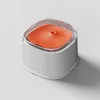 White and orange electric floating bowl