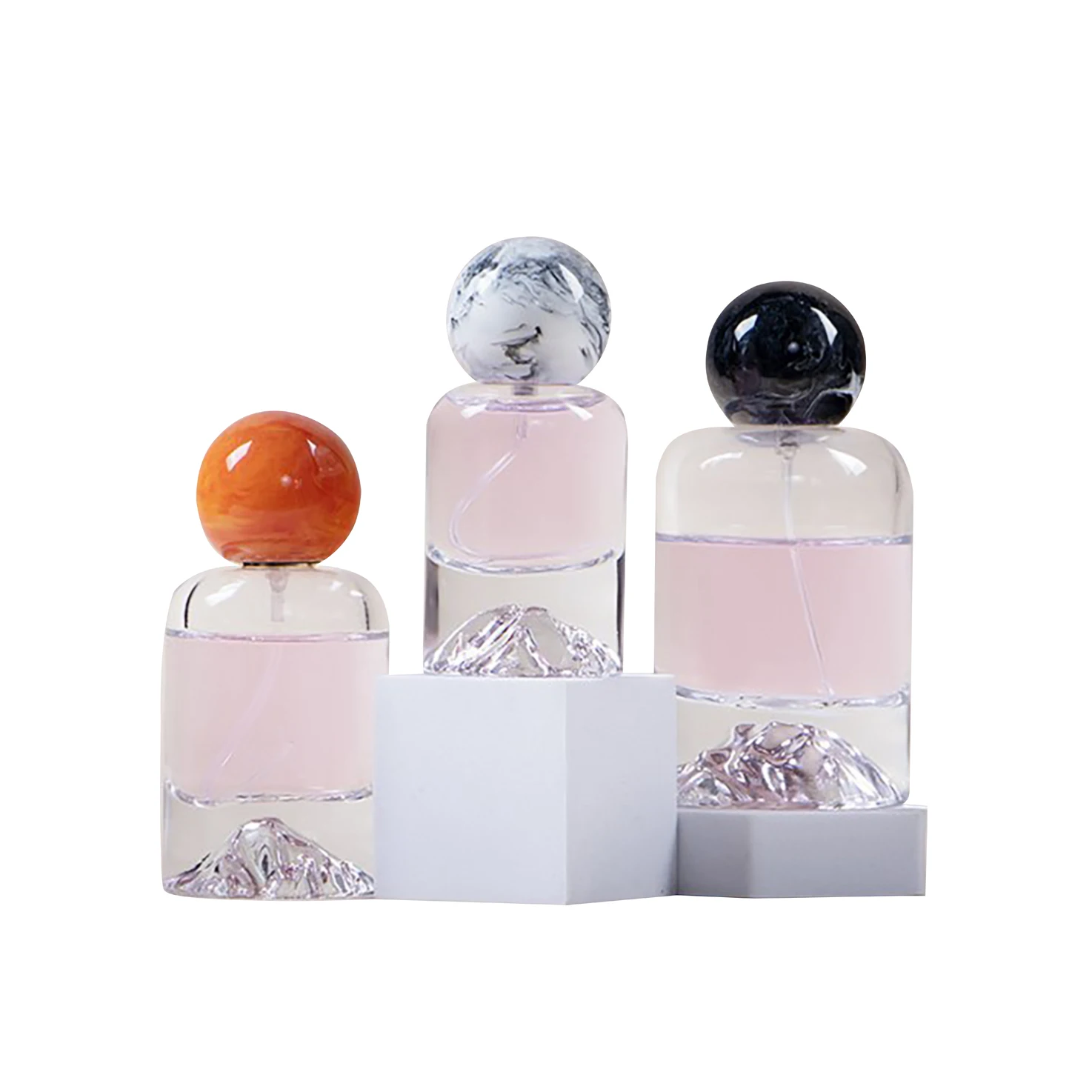 Flacon de parfum en verre de forme ronde en pierre volcanique à fond cylindrique transparent de luxe de 30 ml, 50 ml, 100 ml avec bouchon en résine à bille