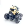 Bigfoot stunt car-camouflage yellow rocket launch vehicle