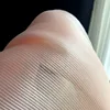 เนื้อสีชมพู (ยืดตรงให้ได้ความยาวหนึ่งเมตร)
