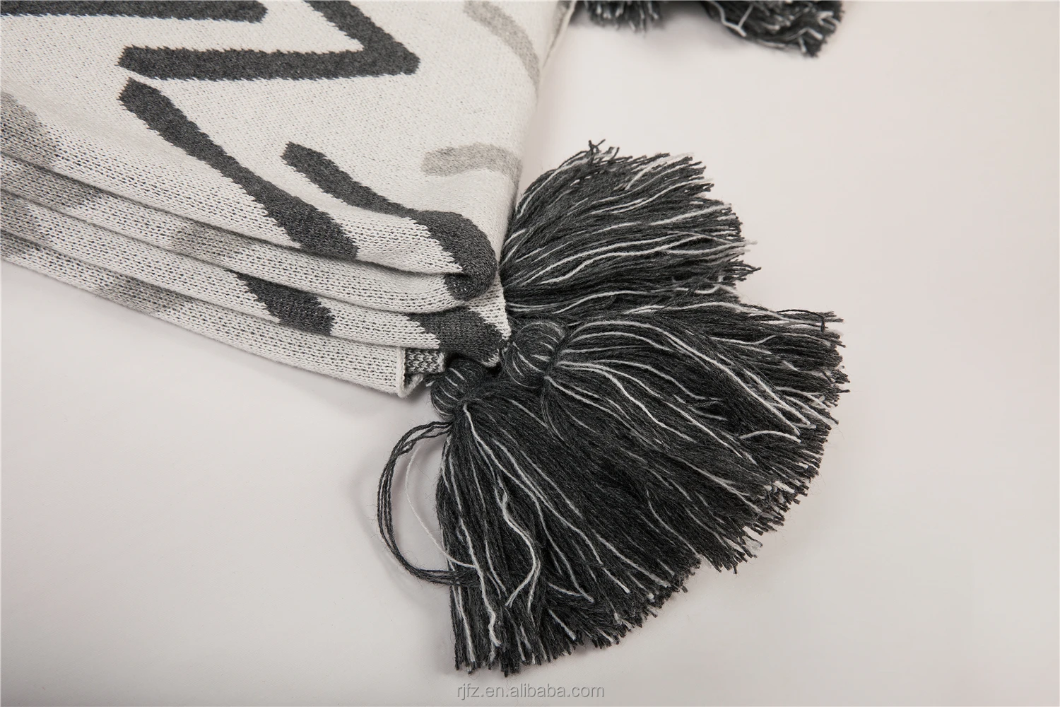 BLK factory wholesale OEM custom logo 100% cotton Knitted Blanket tassel pom pom baby blanket delicate softest throw blanket details