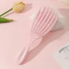 Peine rosa de siete garras