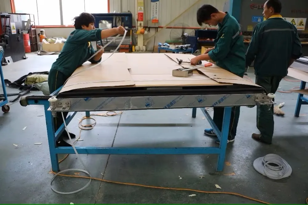 Insulated sliding cold room doors for cold storage and refrigeration systems