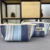 Pajita rayada azul (bolsa de cosméticos)