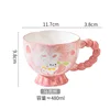 Tazza con manico a forma di cuore di coniglio color pesca