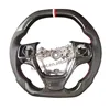 Cuir noir + fibre de carbone + marque de retour rouge et blanche + coutures rouges