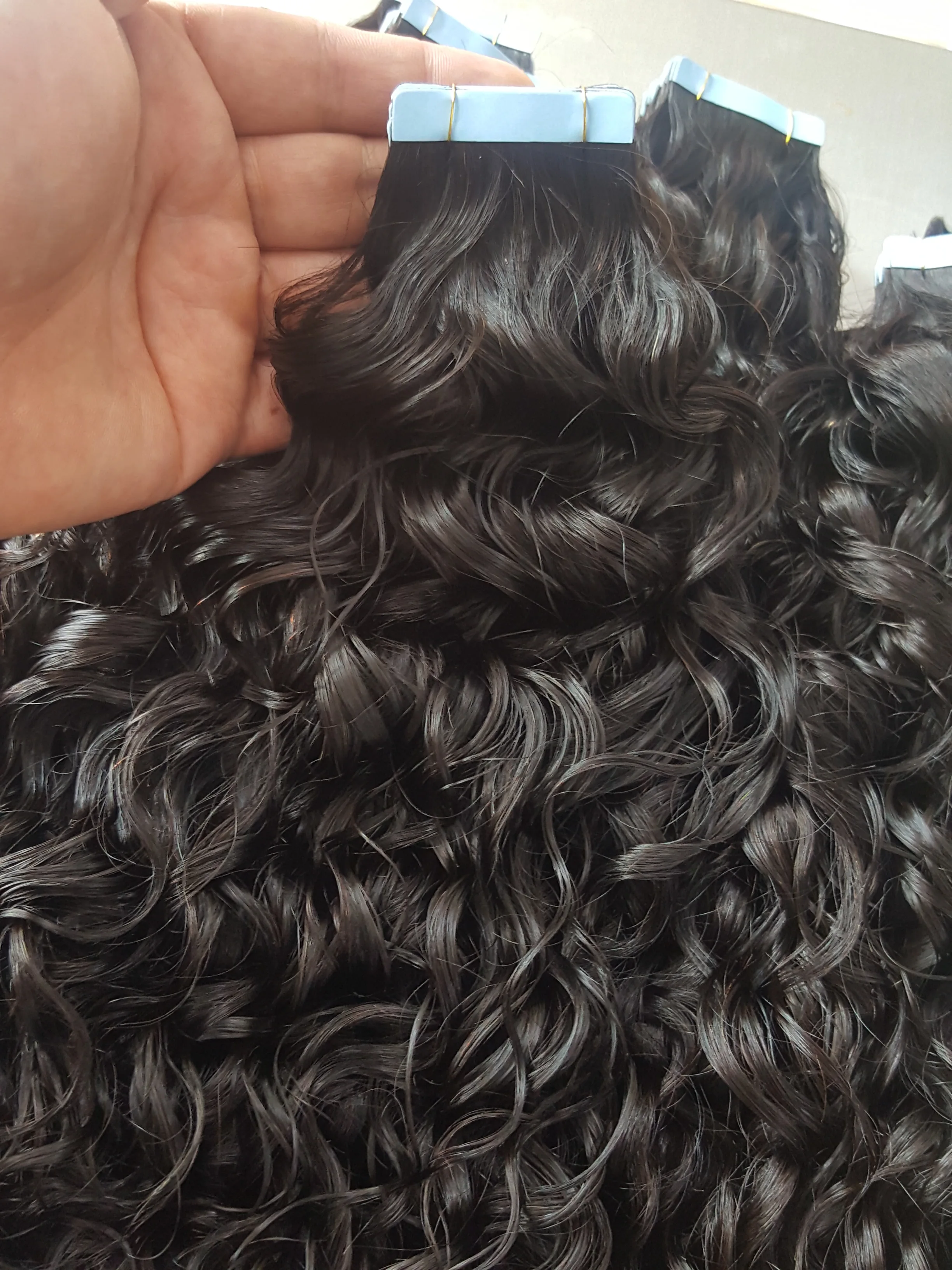 Wholesale Invisible Kinky Curly Tape Hair Extensions 100 Natural Raw