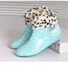 Copertina in cotone azzurro cielo con stampa leopardata a pois