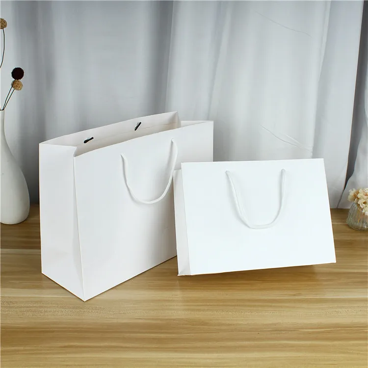 Бутиковая подарочная упаковка пакеты из крафт-бумаги печать логотипа