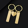 5012 longues bandes + demi-cœur + porte-clés - paire dorée