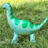 Dinosauro verde blu