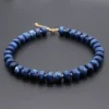 Blu scuro con perline dorate