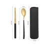 Set de dos piezas negro y dorado (cuchara + palillos + caja)