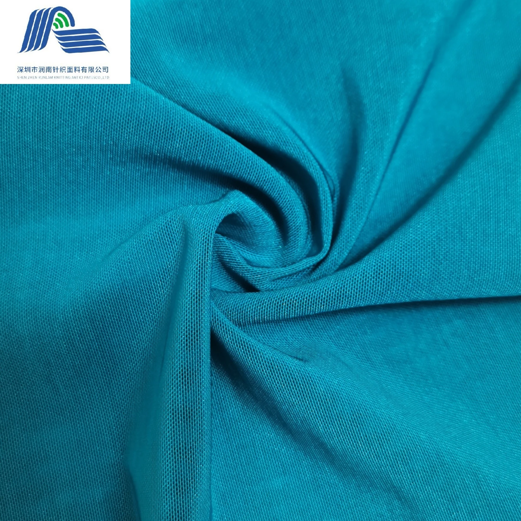 Fabric in cotton, polyamide and elastane - turquoise